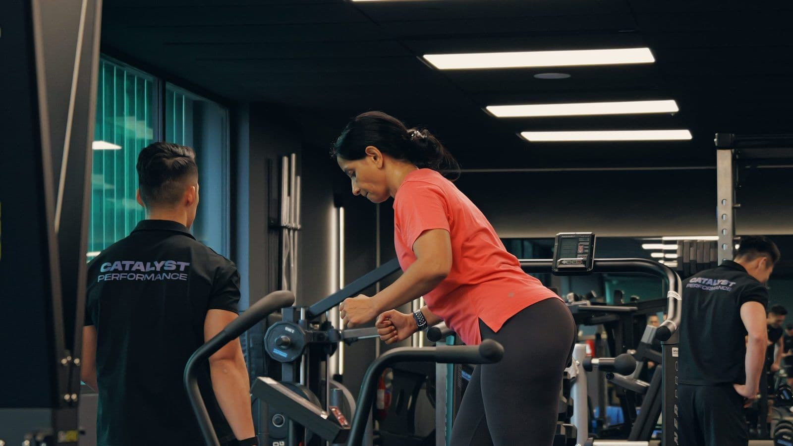 A woman trains with a Catalyst coach in the studio in Singapore CBD