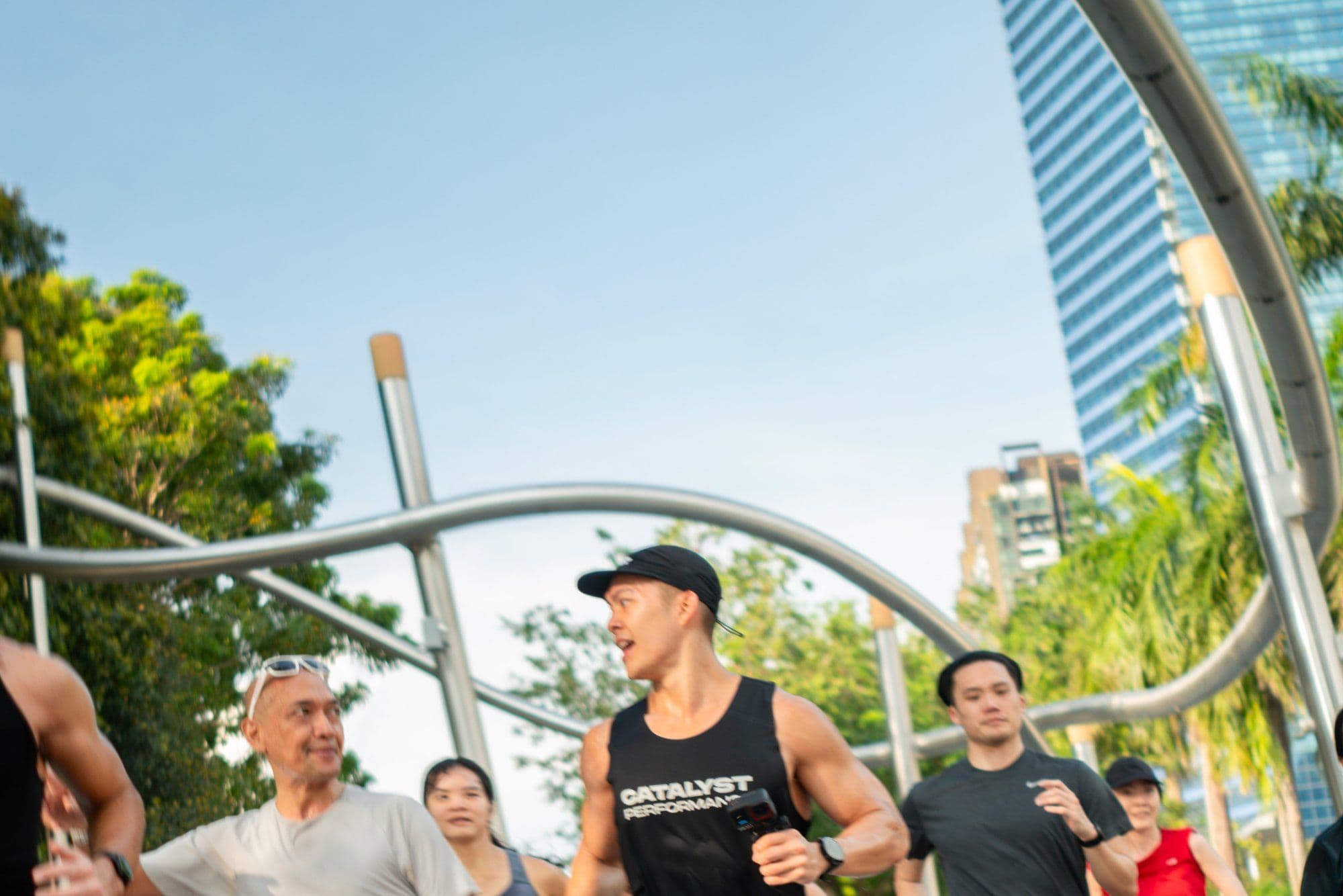 Runners of mixed ages training together in Singapore