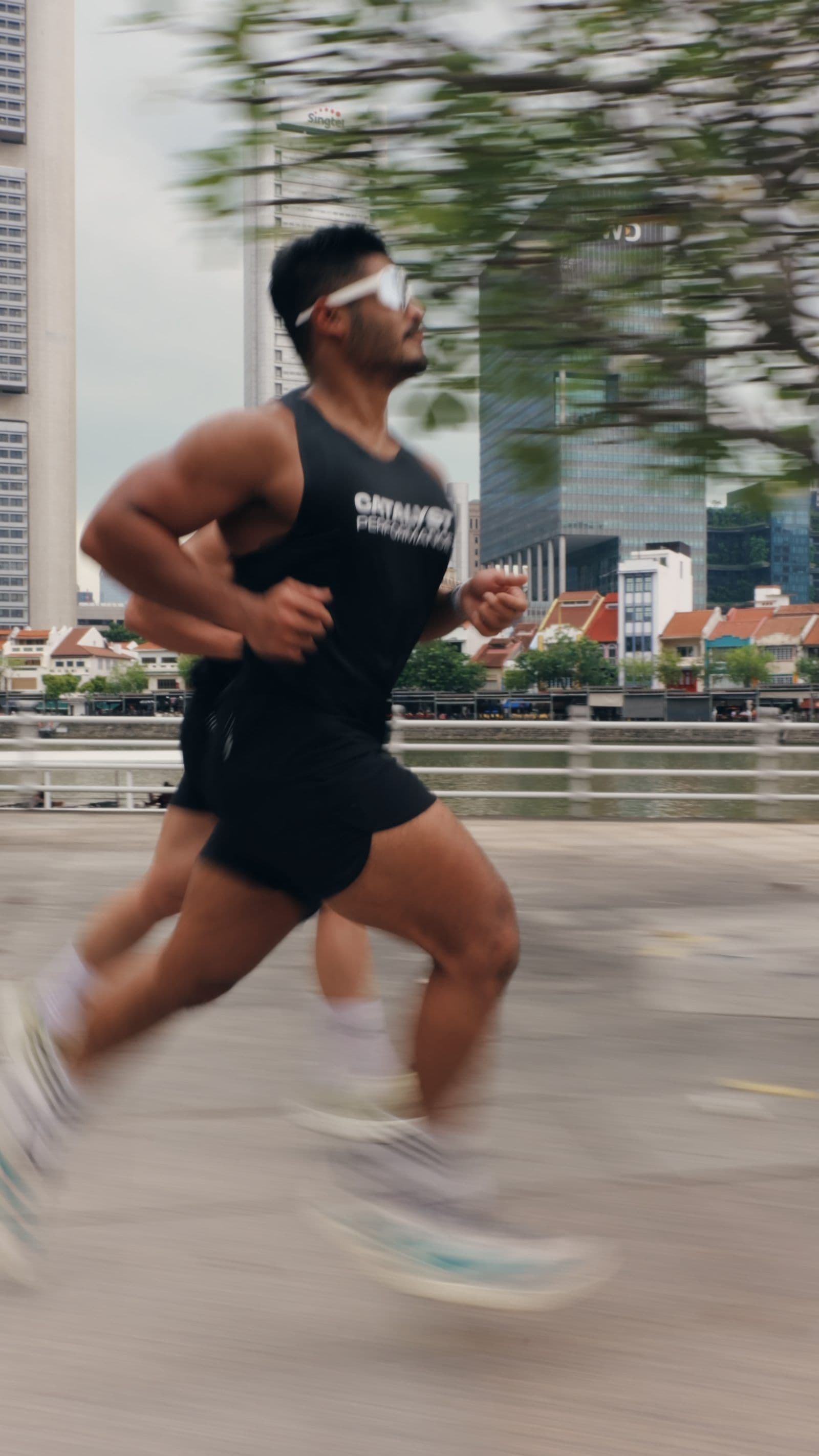 A Catalyst founder running outdoors along the Singapore waterfront