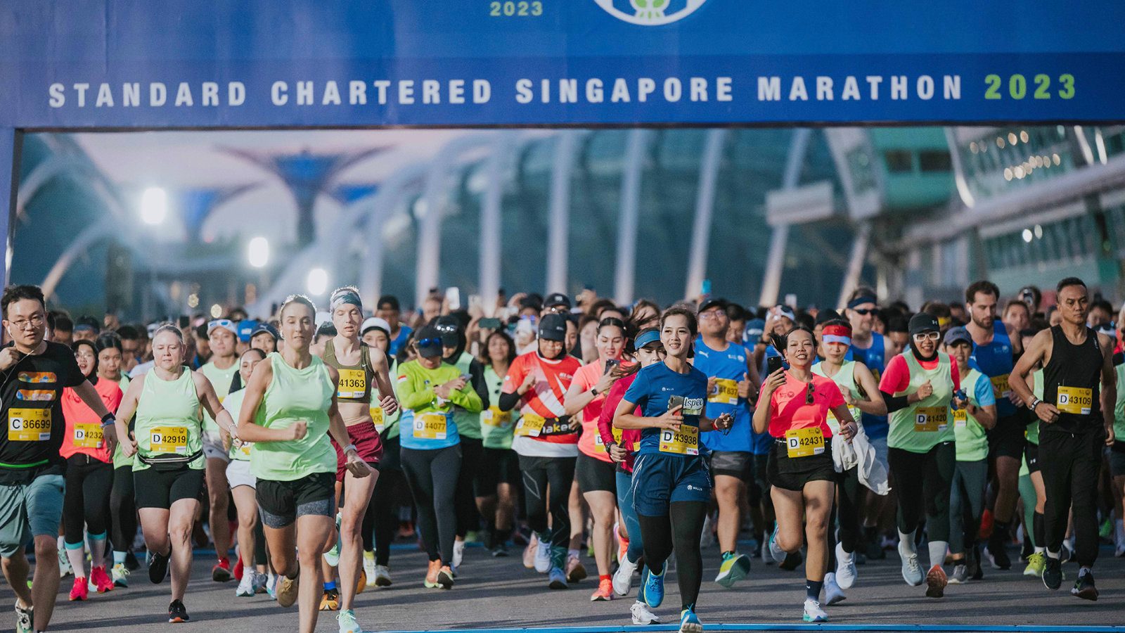 A pack of runners on the course at the Singapore International Marathon